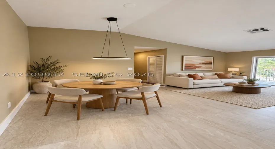Vaulted ceilings, large-format tile flooring, circular modern pendant lighting, and sliding glass door
