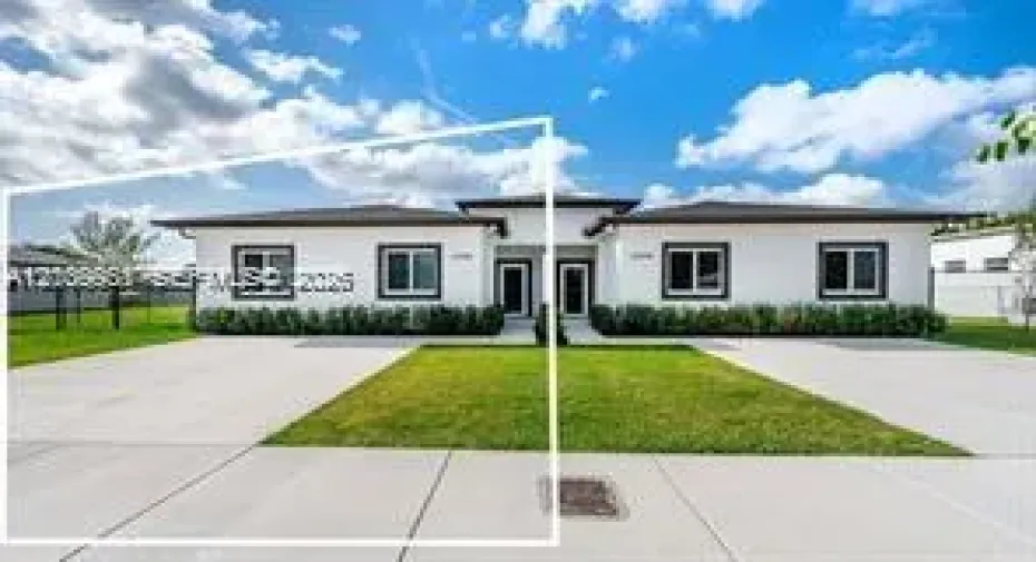 Single-story exterior featuring a crisp stucco finish, dual entryways, concrete driveway, and manicured landscaping