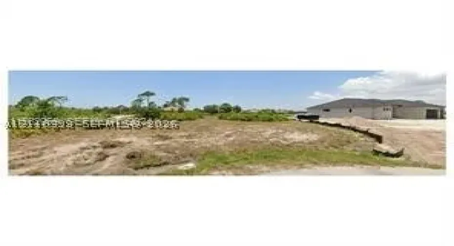 Vacant parcel featuring native vegetation and a level topography