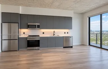Modern kitchen featuring matte grey flat-panel cabinetry, stainless steel appliances, white stone-finish countertops, exposed concrete-texture ceiling, and floor-to-ceiling glass sliding doors