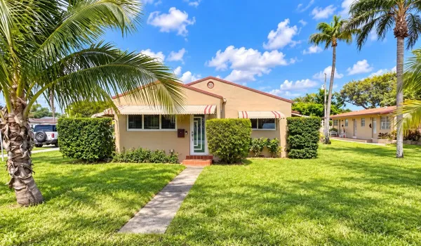 MAKE THIS TROPICAL OASIS HOME...2347 HARDING ST, HOLLYWOOD, FL - BEAUTIFUL CORNER LOT - - SEVERAL BUILDINGS - LARGE COMPOUND