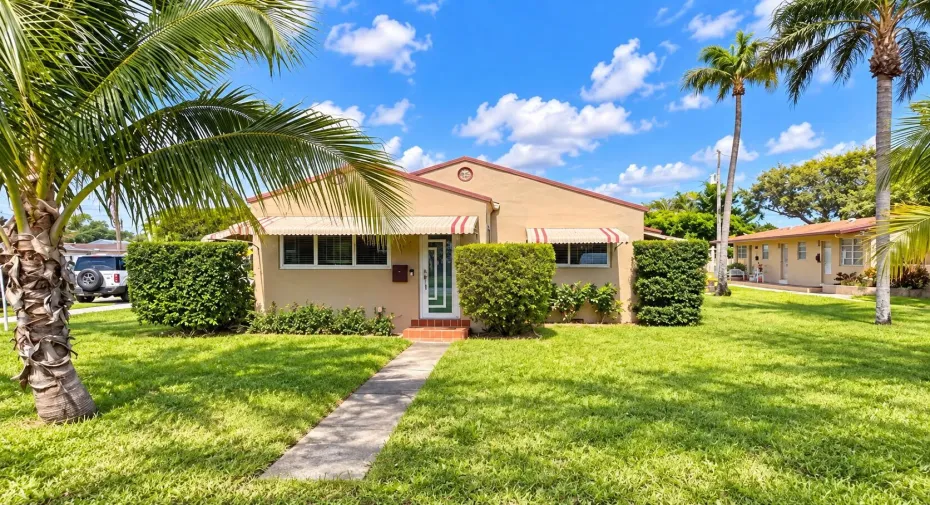 MAKE THIS TROPICAL OASIS HOME...2347 HARDING ST, HOLLYWOOD, FL - BEAUTIFUL CORNER LOT - - SEVERAL BUILDINGS - LARGE COMPOUND
