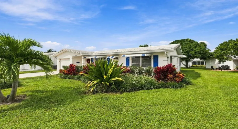 Beautiful landscaping and located on an oversized lot