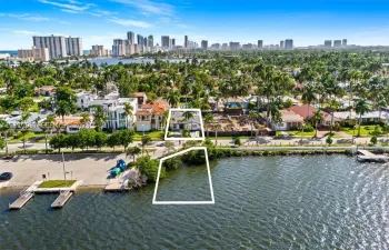 Waterfront parcel featuring direct water access, shoreline vegetation, and open-water exposure