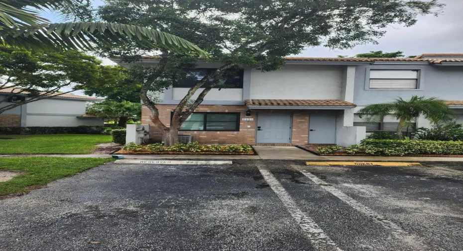 end unit view with assigned parking space