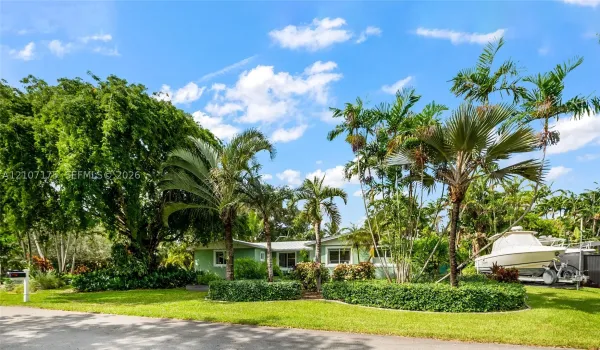 Welcome to your Palmetto Bay getaway! Room for your boat plus beautiful mature landscaping, expansive yard, and established trees.