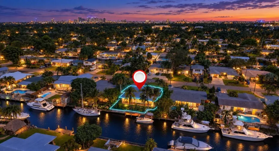 Twilight canal neighborhood with glowing