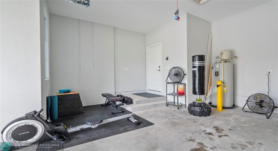 some gym equipment for convenience in the garage