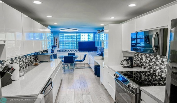 Custom Kitchen with grout free backsplash