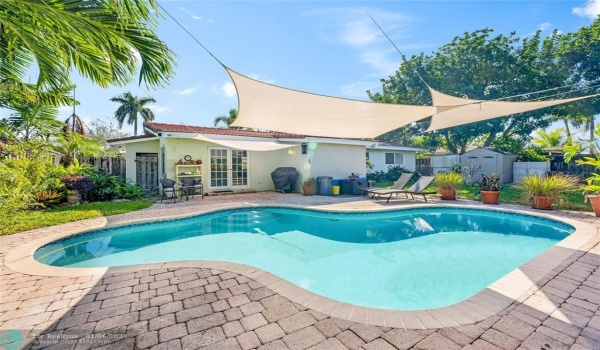Tropical Backyard with Pool