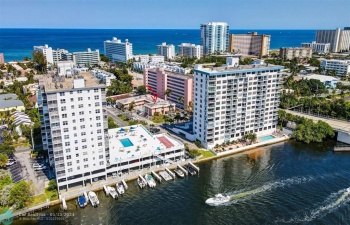 Just in time for season!! If you're looking to live or own an investment property within walking distance from the Beach & Intracoastal?! This furnished 2 bed, 2 bath corner unit on the top floor is it!