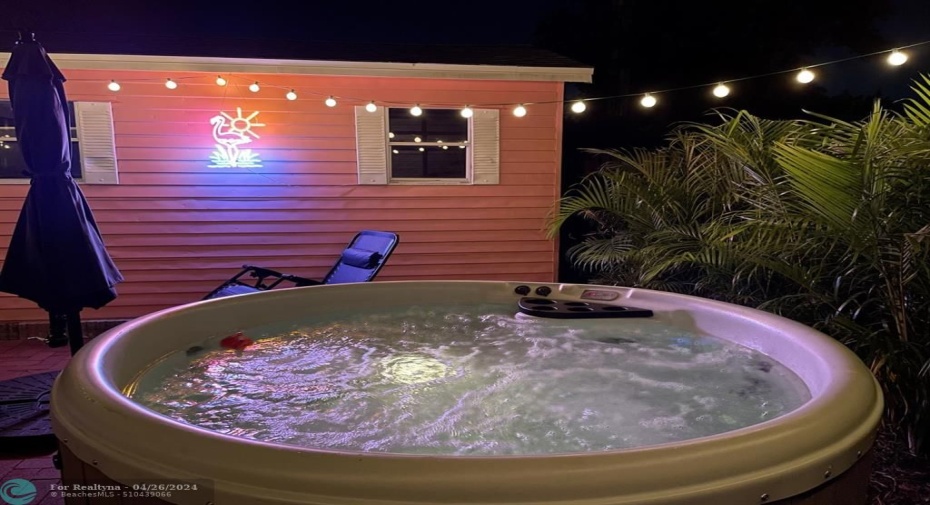 Our 4-person hot tub at night!