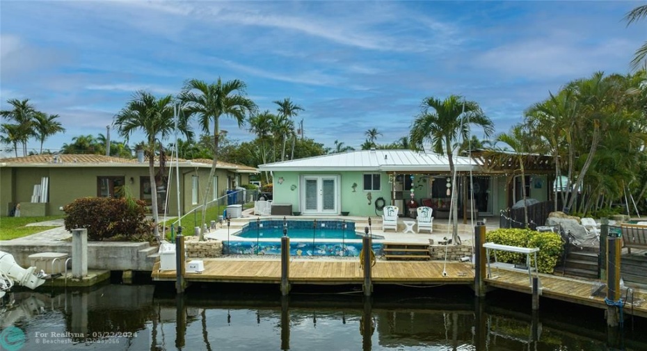 Showing Dock, pool and patio.