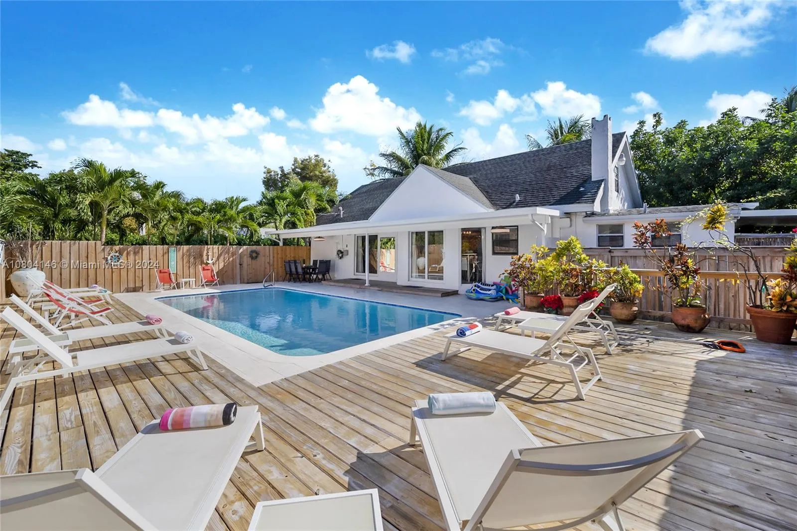 Great pool deck with lots of chaise lounges.