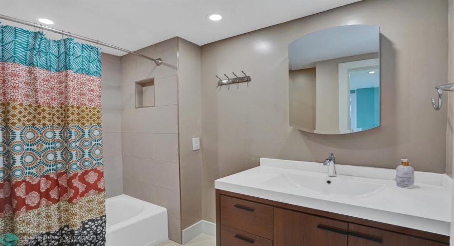 Renovated Bathroom with Shower and Tub