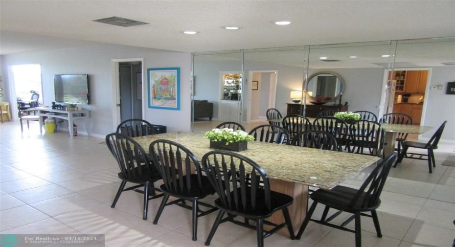 Dining Room with Mirrored Wall