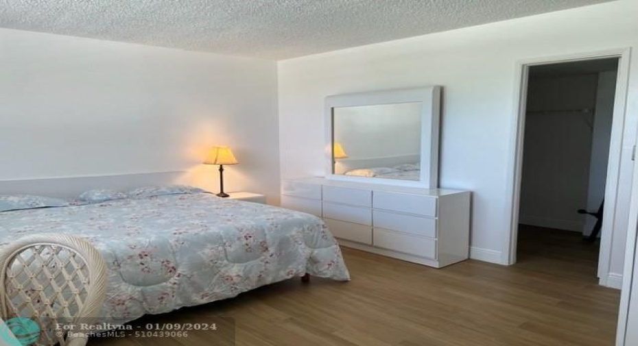 You're not crowded in this lg bedroom & walk-in closet