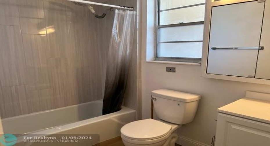 Updated ensuite bath has window for more natural light