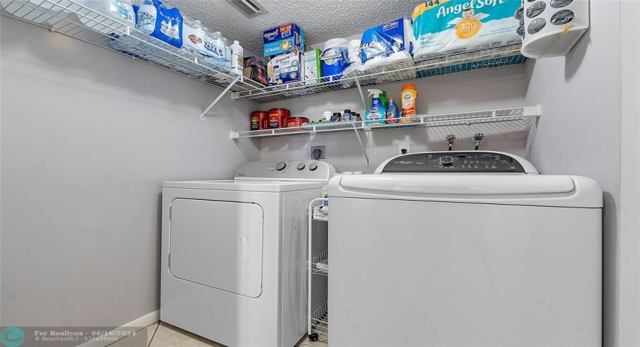 Private Laundry with additional utility closet