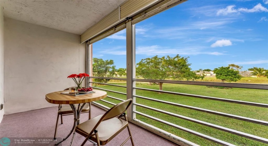 Lovely, fully screened, covered patio with peaceful views!