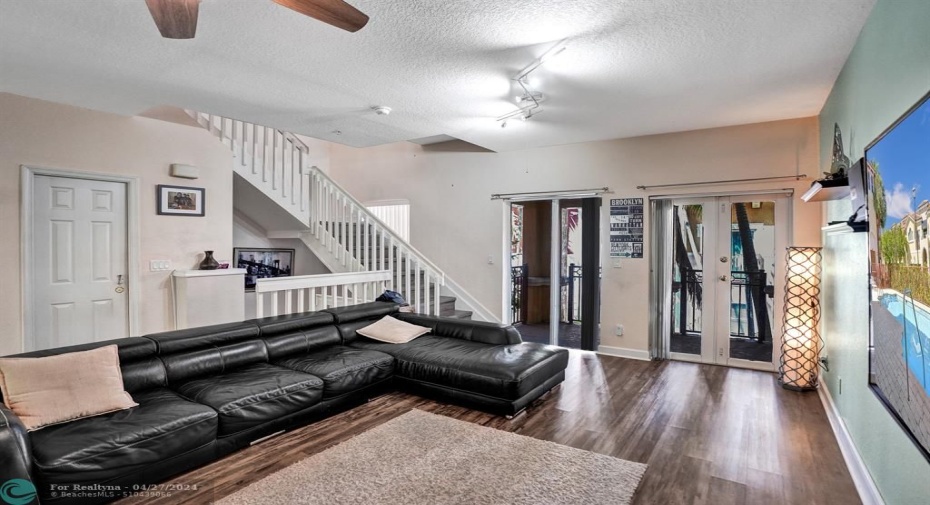 Looking towards the entry doors to the balcony on the 2nd floor.