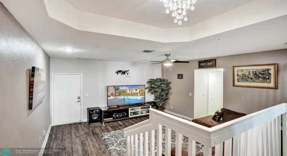 Enter this room from both the front door & the garage (garage door entry on the left)