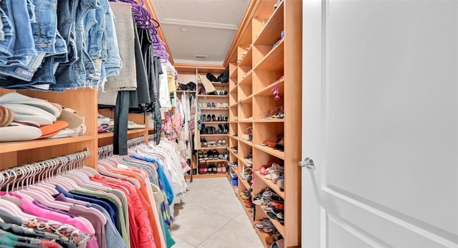 1 of 2 walkin closets in master bedroom