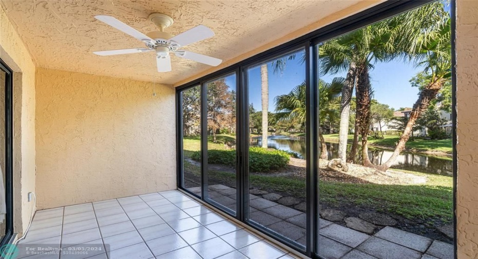 Glass &screen enclosed for all season enjoyment of Florida and lakeview