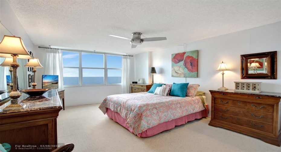 Primary bedroom with direct beach view!