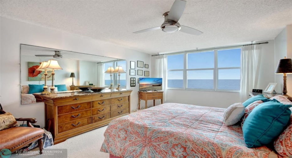 Primary bedroom with direct ocean view!
