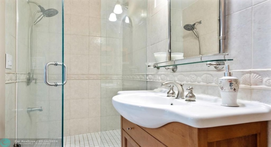 Remodeled with large step in shower