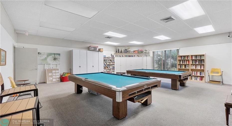 Clubhouse pool room with library