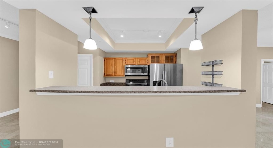 Upgraded open concept condo overlooking the kitchen area
