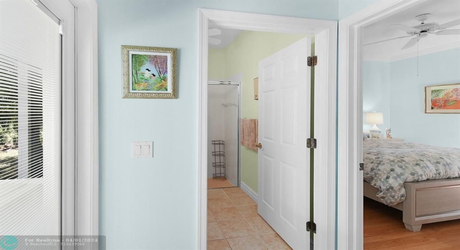 BACK DOOR ENTRANCE TO BATHROOM AND GUEST BEDROOM