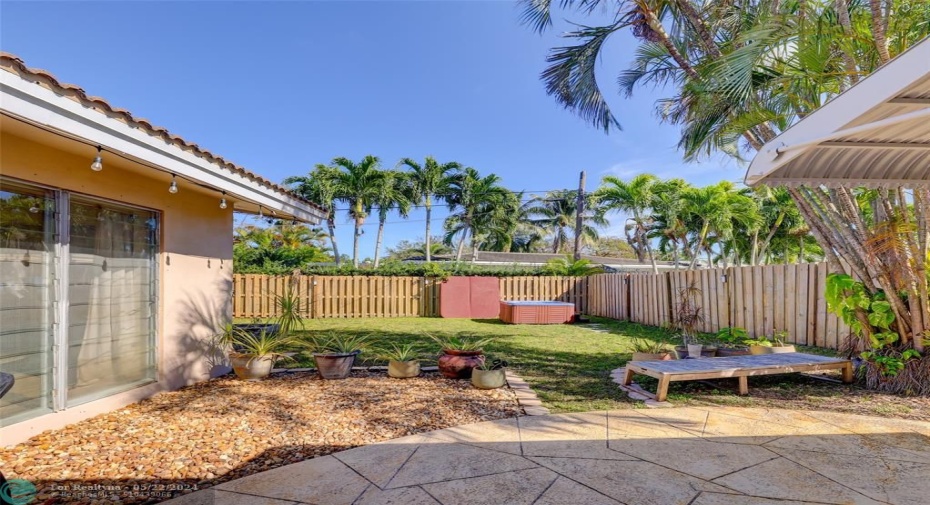 Beautifully manicured and fenced yard with room for a pool.