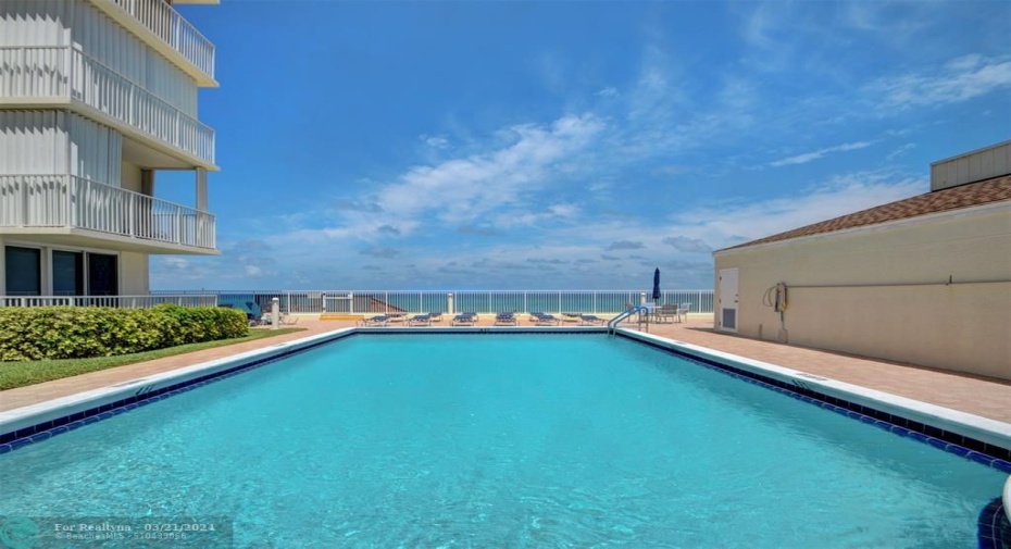 Heated swimming pool overlooking the ocean
