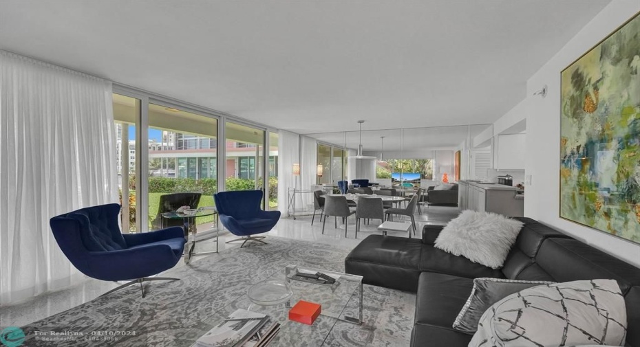 Spacious living and dining area with gleaming terrazzo floors.