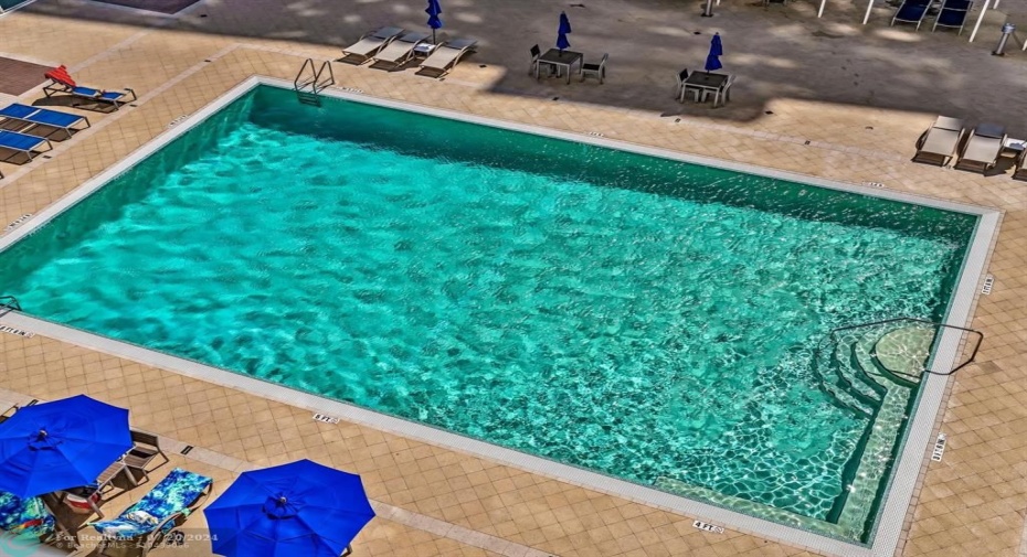 view of pool from balcony