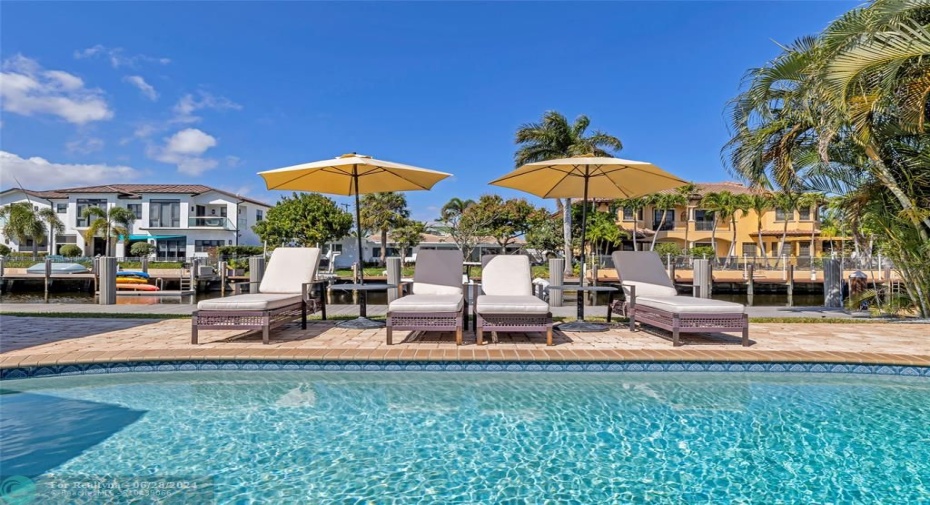 Sunbathe by the pool and water and enjoy living in fabulous South Florida