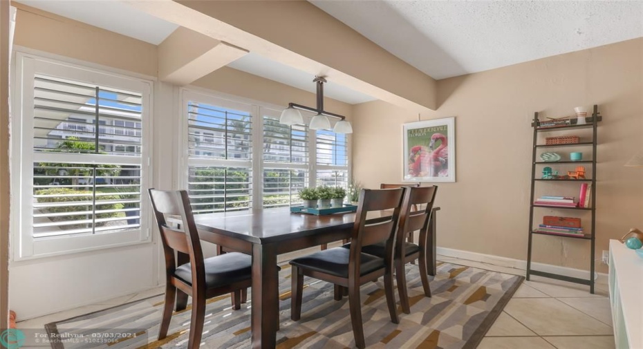 Formal dining Room. Attractive Shutters in all windows.