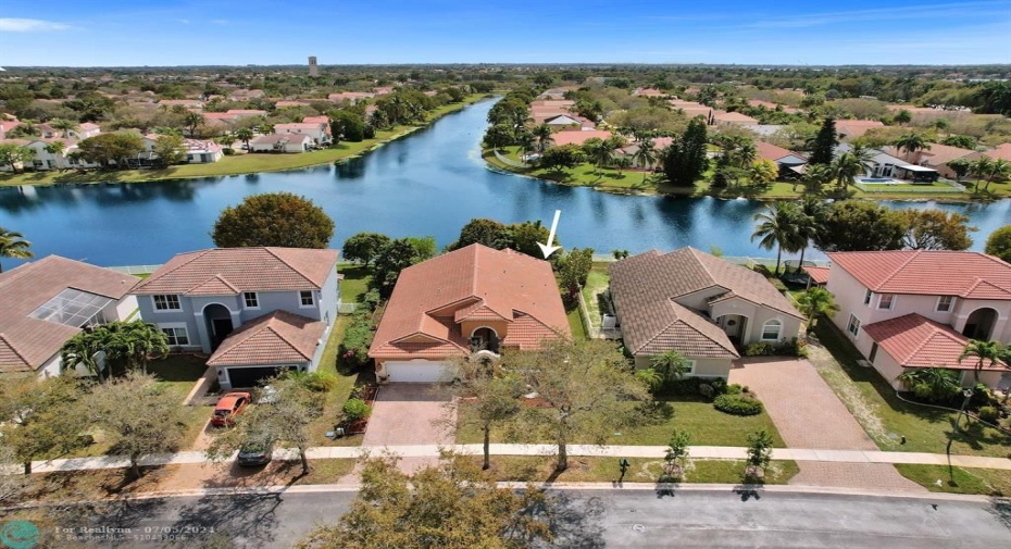 Incredible one story lake front 4/3 Gated Sunset Lakes!