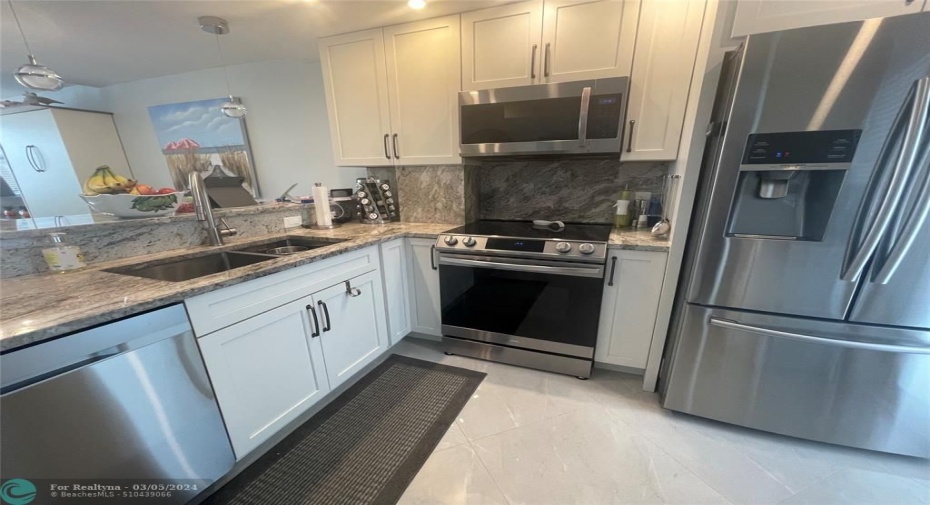 Beautiful Kitchen with Stainless Appliances and Granite Countertops
