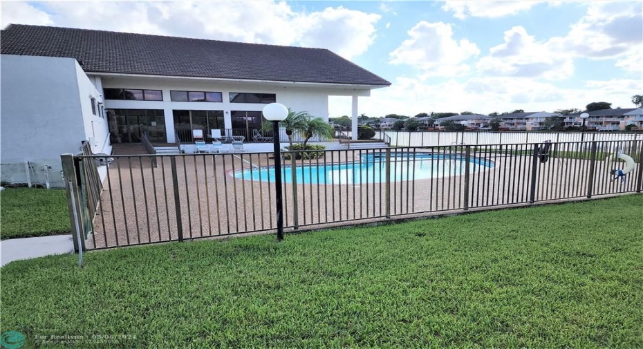 Fenced in community pool & clubhouse