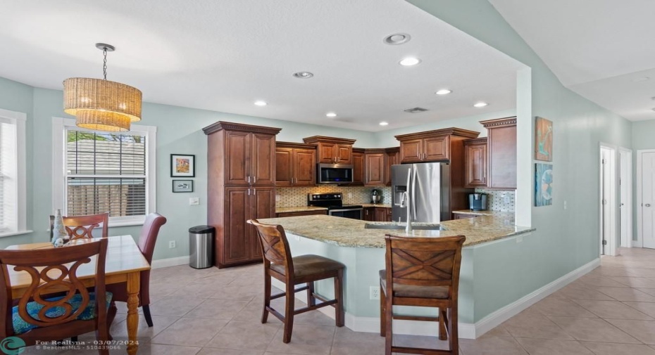 upgraded kitchen to include soft close, pull out drawers, backsplash and countertops