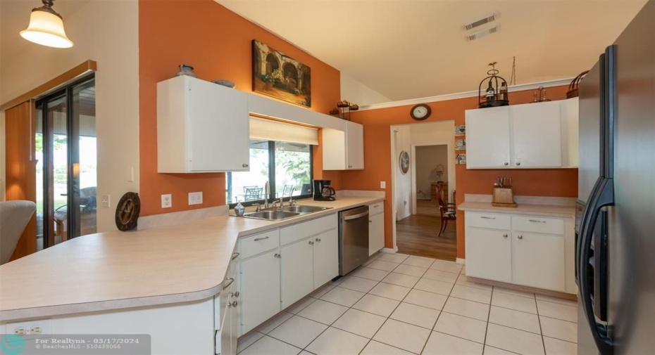 Kitchen with pass-through windows to the covered lanai.