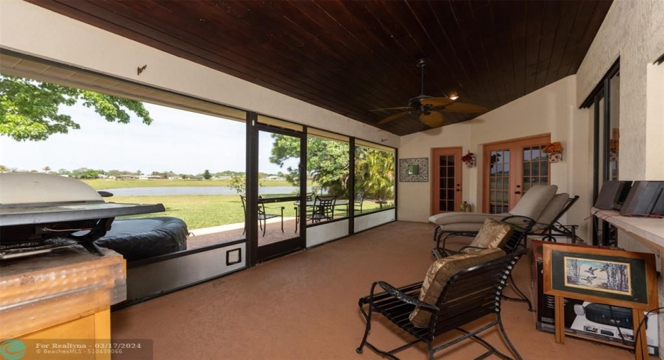 Screened in patio/lanai with Cypress ceiling.