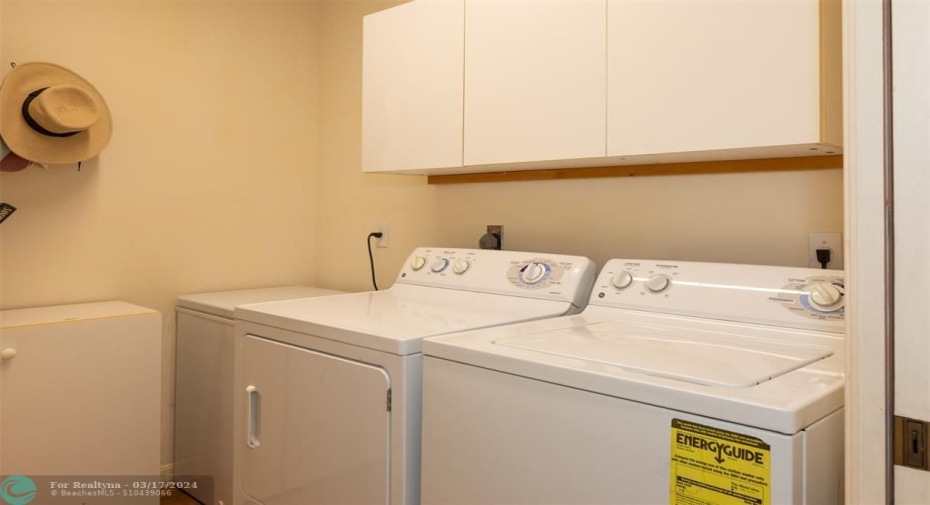 Includes washer/dryer with plenty storage.