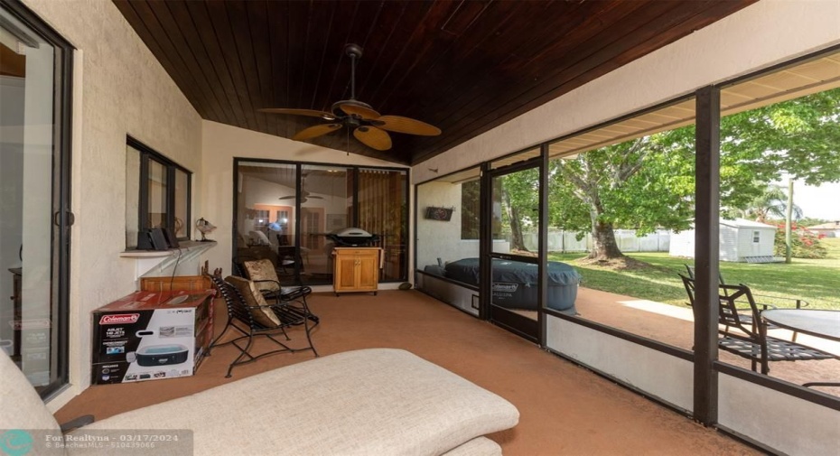 Screened in patio/lanai with Cypress ceiling.