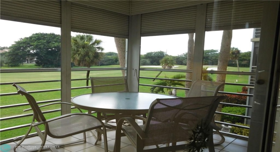 SCREENED BALCONY WITH GOLF VIEW