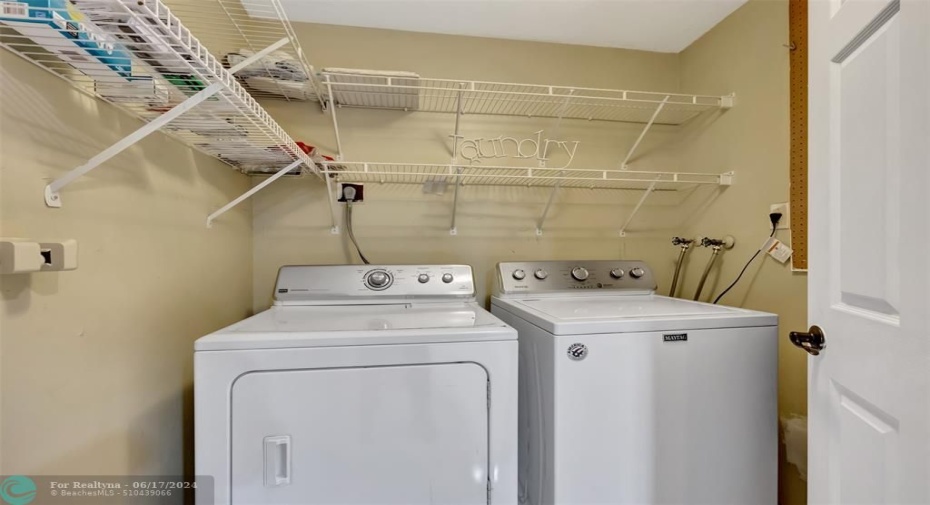 dedicated laundry room full size w/d, hwh to right